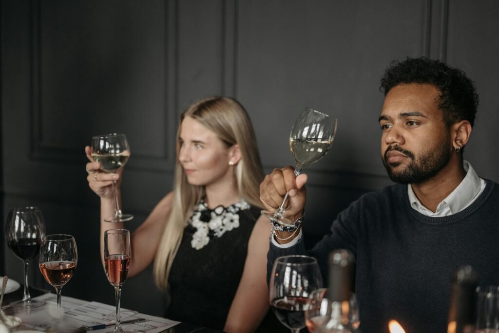 Picture of a man and woman at a wine tasting.