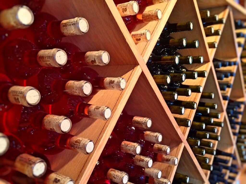 A photo of a wine rack with different bottles of wine